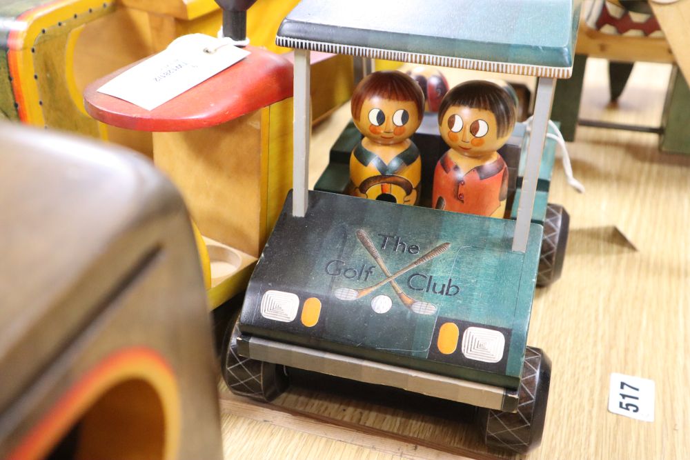 A collection of hand-crafted painted wooden toys, 1980s,